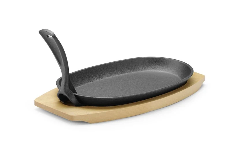 HENDI Gusseisenplatte mit Holzunterlage und Griff – Oval – Schwarz – 280 × 143 × H 33 mm